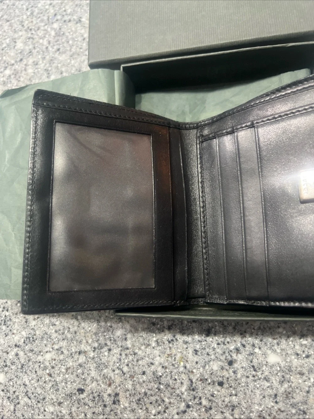 Gucci Black Leather Bifold Card Holder with Silver G-Clip Accent